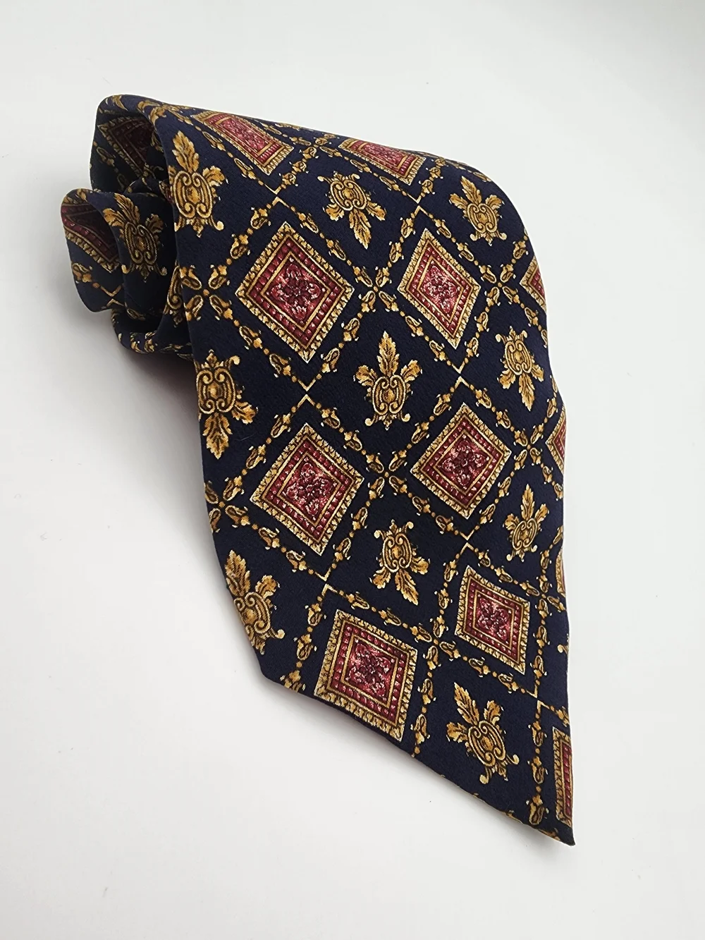 MMA Classic Navy Men's Tie with Gold and Burgundy Medallion Pattern